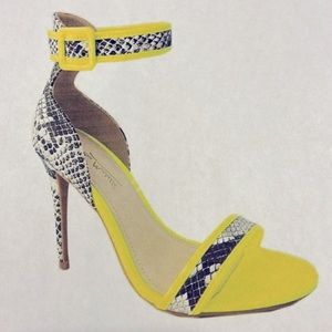 Anne Michell Black & White snake skin heels with yellow trim & yellow buckle.